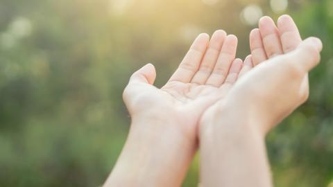 Giving hands uplifted