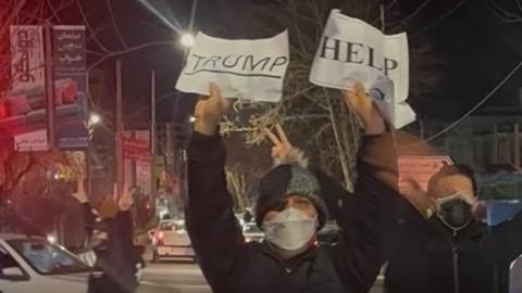 iranprotestorstrumpsign.jpg