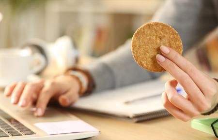 Woman holding a cookie 