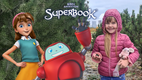 Zlata, a young girl from Ukraine, stands in a Christmas tree farm and smiles. Joy and Gizmo are to the left, smiling and waving. The CBN Animation and Superbook logos are stacked at the top center of the photo.