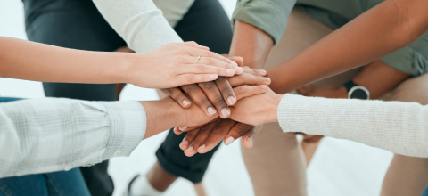 group-hands-in_fb.png